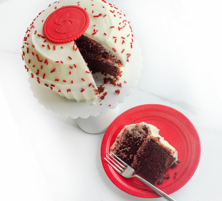 We bake our cupcakes fresh daily. (Shown: Giant Vegan Red Velvet cupcakes.)