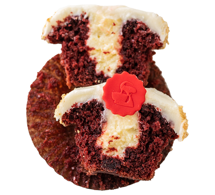 We bake our cupcakes fresh daily. (Shown: Red Velvet CHEESECAKE cupcakes.)