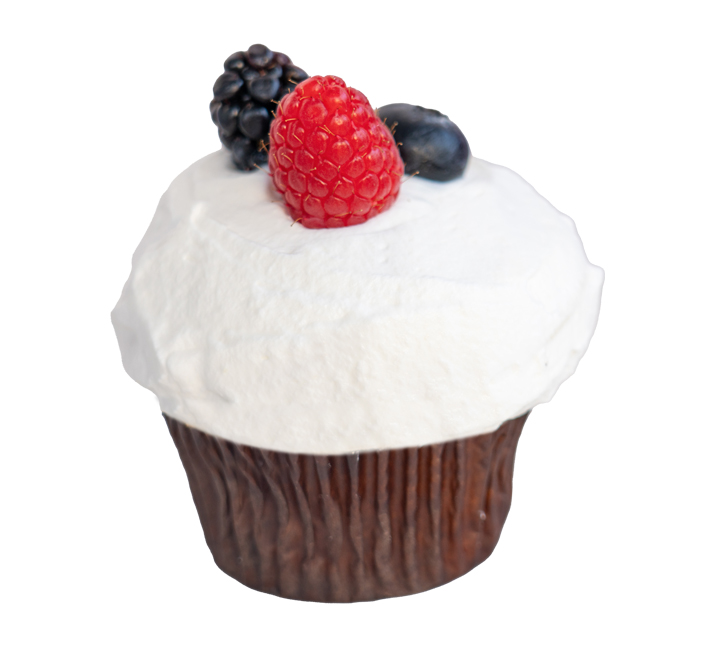 We bake our cupcakes fresh daily. (Shown: Chantilly Berries and Cream cupcakes.)