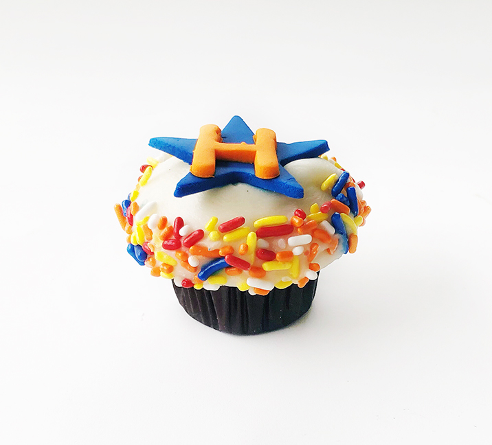 We bake our cupcakes fresh daily. (Shown: Home Team Mini Confetti Cupcake cupcakes.)